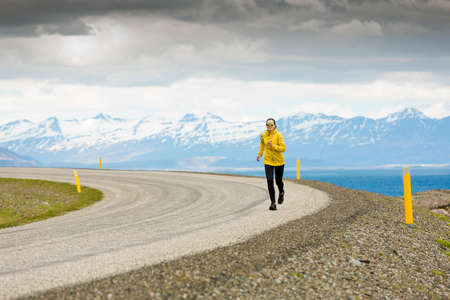 Woman running on a winter day