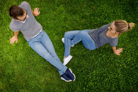 Top view of a happy young couple in the park togetherの写真素材