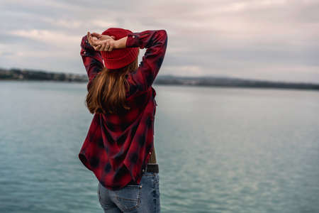 Beautiful woman enjoying her day on the lake