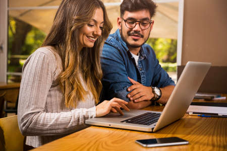 Friends studying together for the upcoming examsの写真素材
