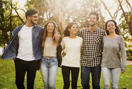 Group of friends having  a great day in the park