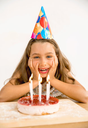 Shot of a happy young girl celebrating her birthday9の写真素材