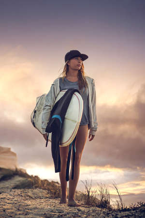 A beautiful girl after a great surf sessionの写真素材
