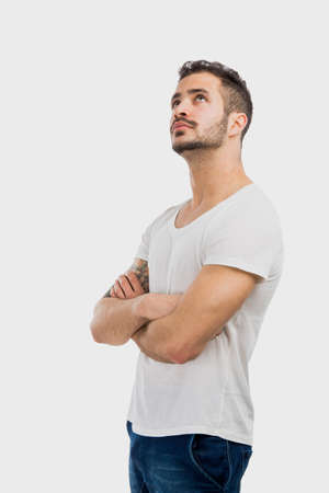 Studio portrait of a man thinkingの写真素材