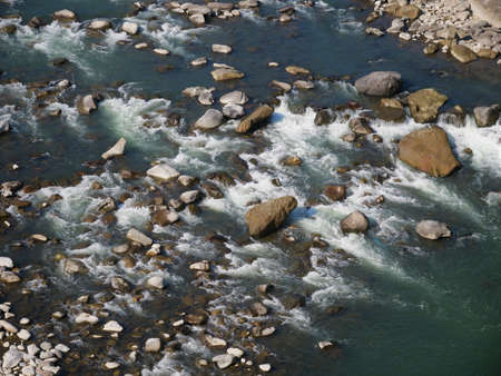 a river that flows between rocksの写真素材