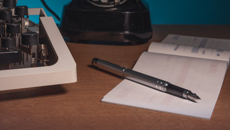 typewriter, old telephone, checkbook, ink pen - retro installation