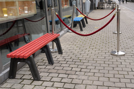 Benches in front of the entrance to the store, convenience for customers. entrance decor.