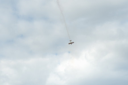 The fall of a burning light aircraft. Simulation of a model airplane falling with smoke in a view...
