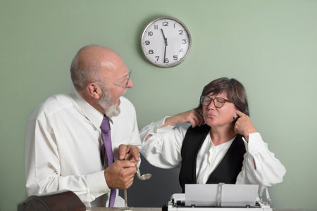 Conflict in the office, the boss scolds the subordinate. Time is over. Workplace in a retro office.