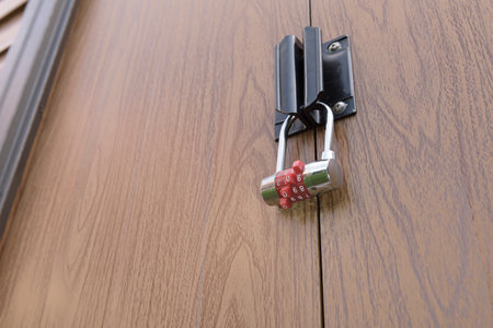 The padlock. View of a closed padlock on the garage door. dial code. Place for text