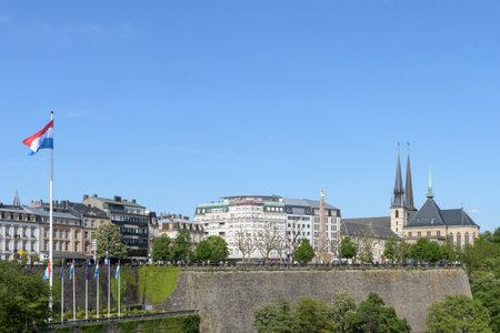 Luxembourg city-Luxembourg 06-05-2023. Panorama Luxembourg city center. Main buildings, waving national flag. Visitor's areaのeditorial素材