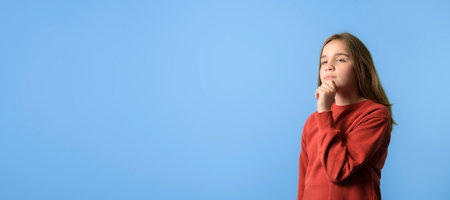 The new school year. Banner portrait of nice-looking teen girl 10 years old thinking creating new...
