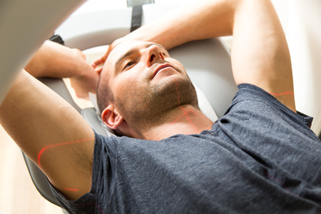 Patient examined in x-ray computed tomography CT at radiology clinicの写真素材