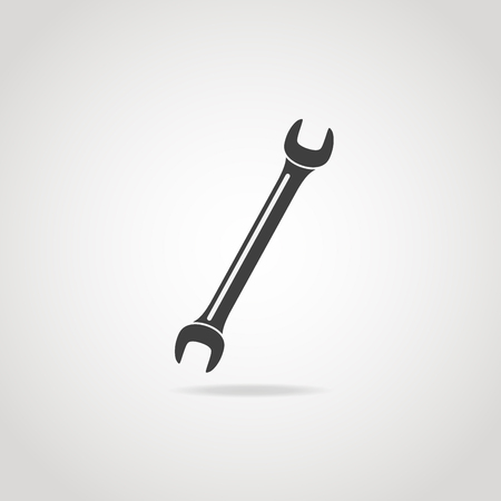 Black icon of open-end builder wrench.のイラスト素材