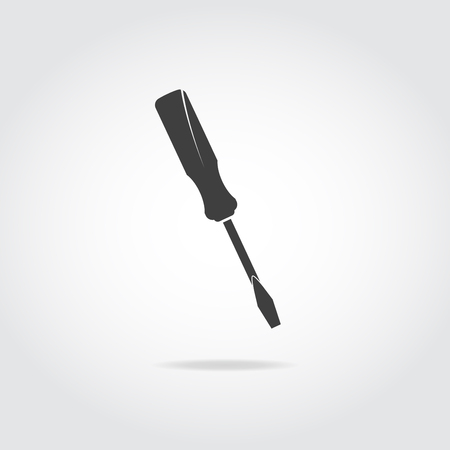 Simple illustration of black screwdriver with slot head.のイラスト素材