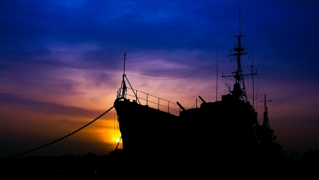 old Military war ships in sunset backgroundの写真素材