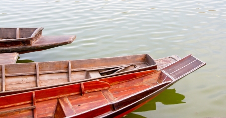 old wooden boat in the riverの写真素材