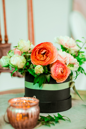Flower decoration over a brown chair.の写真素材