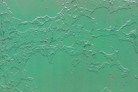 Old green metallic background with peeling and cracked paint. Seamless texture.の写真素材