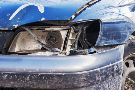 Broken headlight on the car, close-upの写真素材