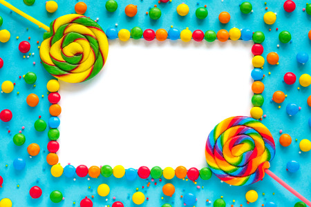 Rainbow candy background, frame mockup isolated, greeting card, Top view, Flat Layの写真素材