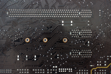 Fragment chips of the motherboard or mainboard as backgroundの写真素材