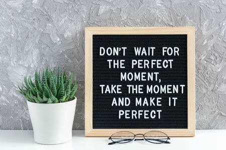 Don't wait for the perfect moment, take the moment and make it perfect. Motivational quote on letter...
