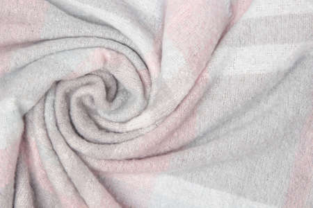 Warm woolen plaid close-up. Abstract textile background or texture. Winter cozy background for cold weather.の写真素材