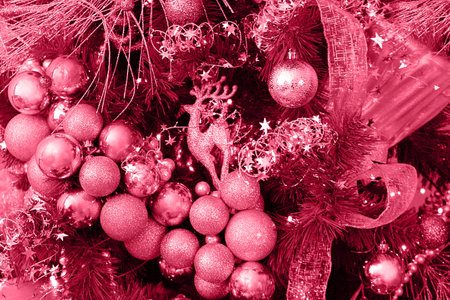 Trendy color of the year 2023. Christmas or New year decoration toned in viva magenta color.の写真素材