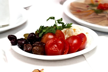 vegetable salad with pickled grapes, marinated cabbage, pickled tomatoes and cucumbersの写真素材