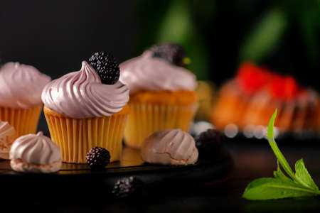 A popular dessert for tea and coffee is butter cream muffins.の写真素材