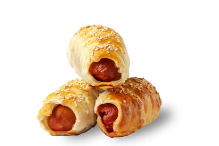 Sausage in dough. Sausage roll isolated over white background.の写真素材