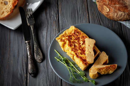 Fresh French omelet with fresh pea sprouts. Vegetarian foodの写真素材