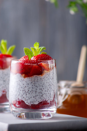 Healthy pudding with chia seeds and strawberries with honey. Healthy eatingの写真素材