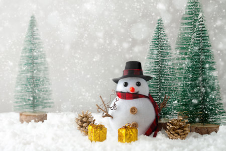 Christmas background. Snowman, Christmas balls, Christmas tree and snow.の写真素材