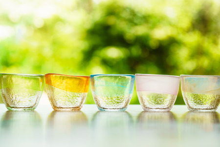 Colorful glass cupの写真素材