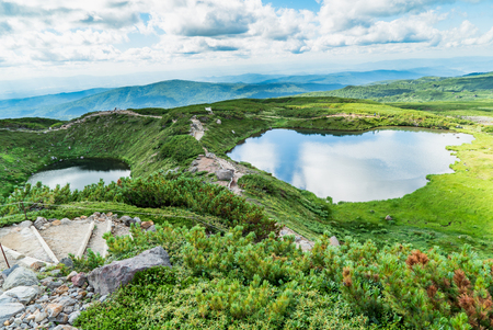 "Fufu Pond" in high plain in M e undt Asahidake (highest mountain of in in hokkaido, japan). It is located in the northern part of the Daisetsuzan National Park.の写真素材