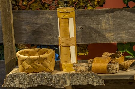 irchbark dishes on the wooden shelfの写真素材