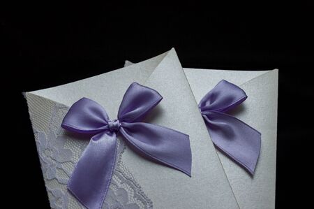 wedding invitation on black backgroundの写真素材