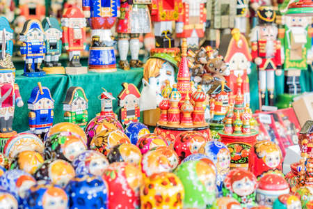 closeup of wooden souvenirs for sale in market place in Moscowの写真素材