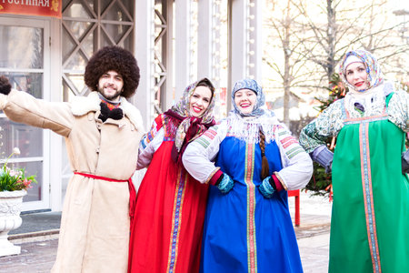 MOSCOW, FEBRUARY 13, 2018: Street actors in russian national clothes at Shrovetide (Pancake week) celebration in Moscow city center.のeditorial素材