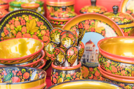 Khokhloma utensils. Wooden spoons and bowls in in Russian folk styleの写真素材