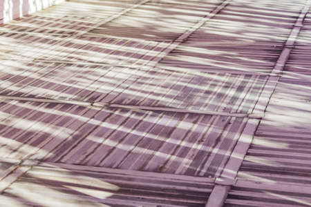wooden floor with trees shadows outdoors