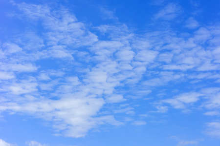 blue sky with fluffy clouds background