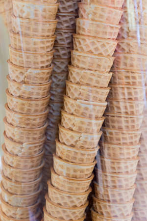 wafer cones behind the glass of window shopの写真素材