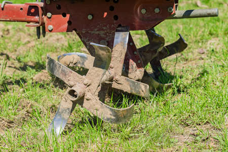 close up of plow of handle tractor for plowing the ground, farming equipmentの写真素材