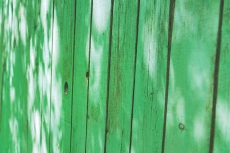 old wethered green wooden fence background texture, Perspective viewの写真素材