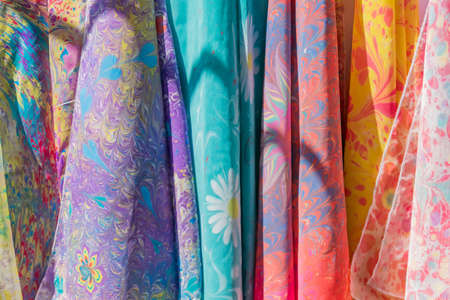Range of colorful silk  scarfs in the shop.の写真素材