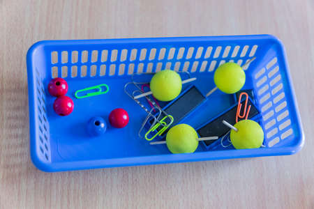 School laboratory stuff in a blue plastic containers. study of natural sciences