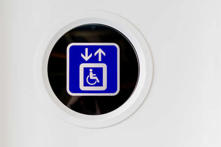 Lift for disabled people. Sticker sighn on elivator door in the officeの写真素材